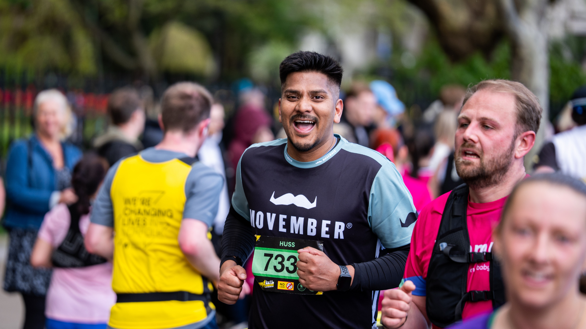 Excited Movember runner at a race event