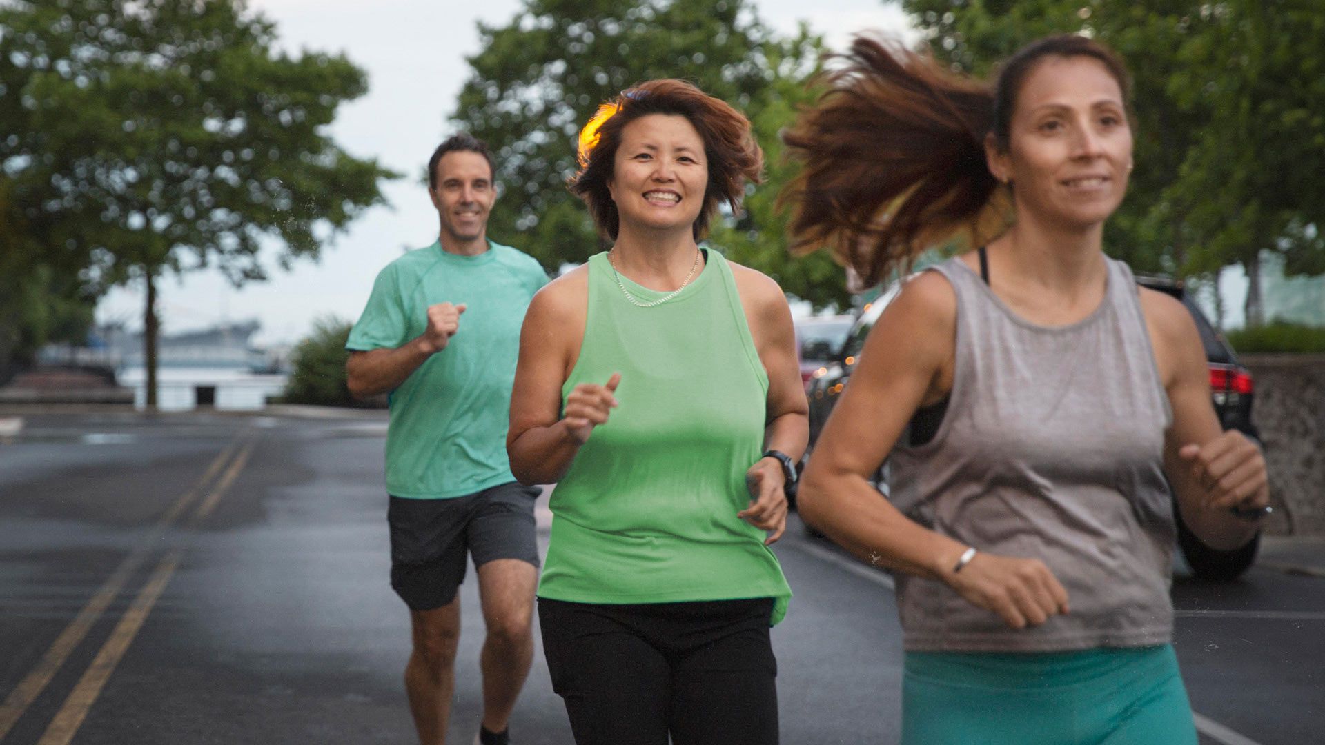 Photo of people joyfully running together.