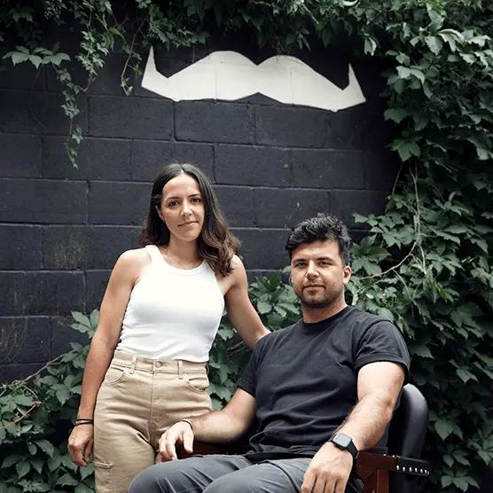 Young man and woman helping promote Hello Jack program.