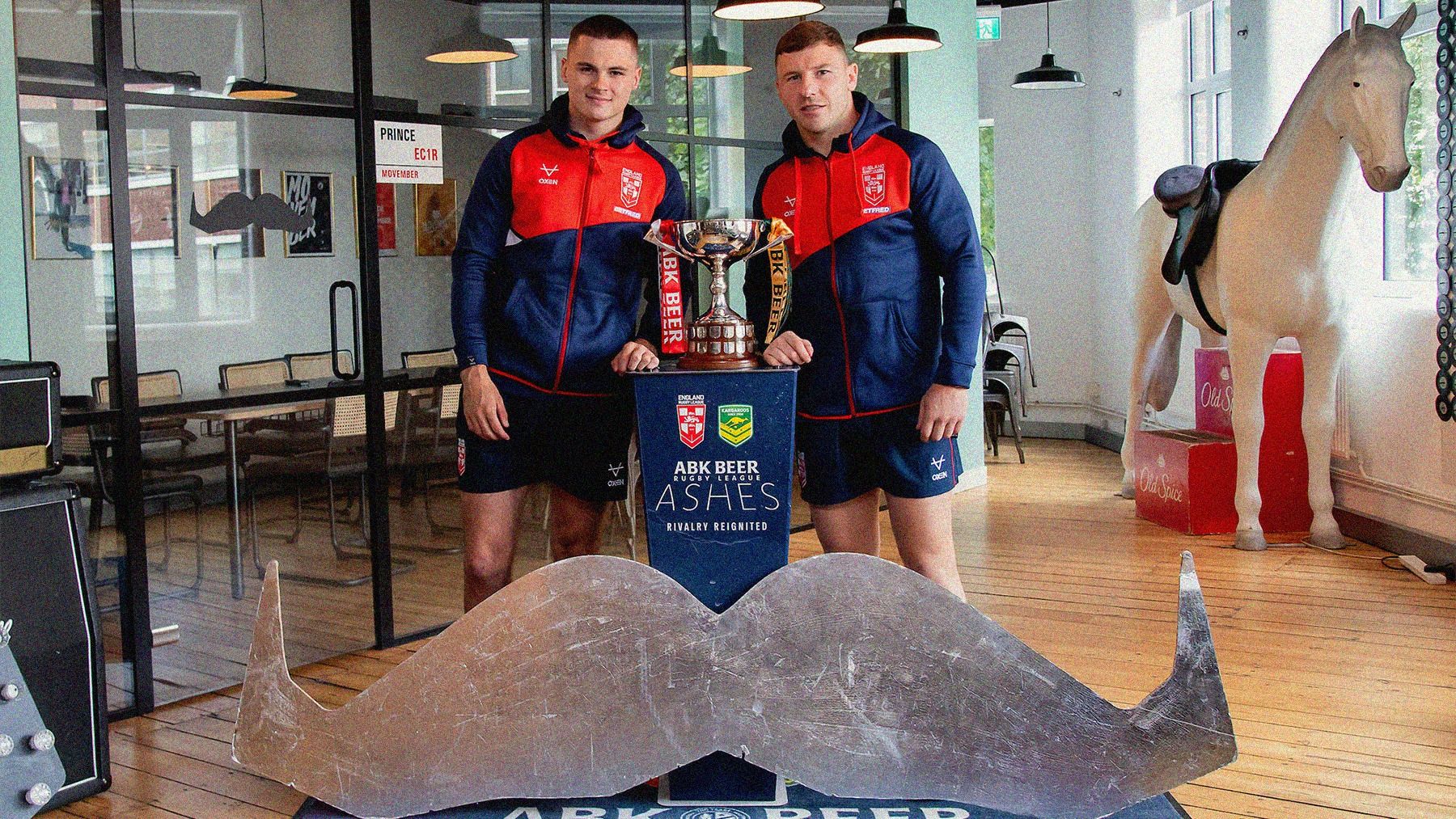 Rugby players at Movember office for the partnership