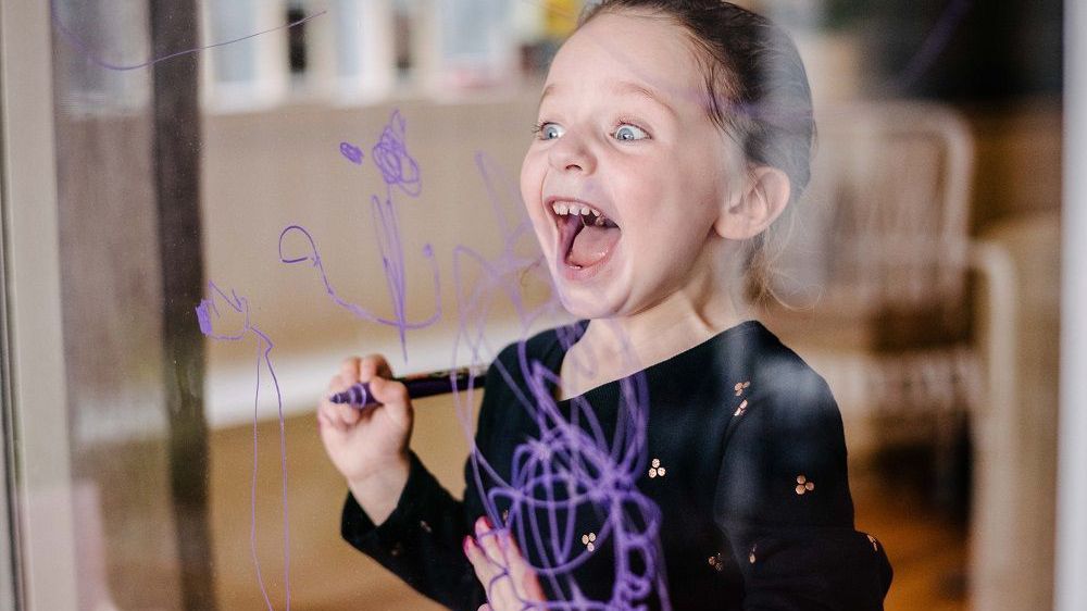 Over-excited toddler scribbling on a wall.