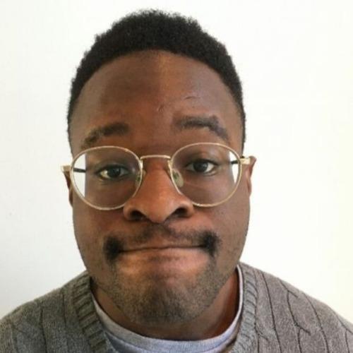 Smiling man looking to camera.