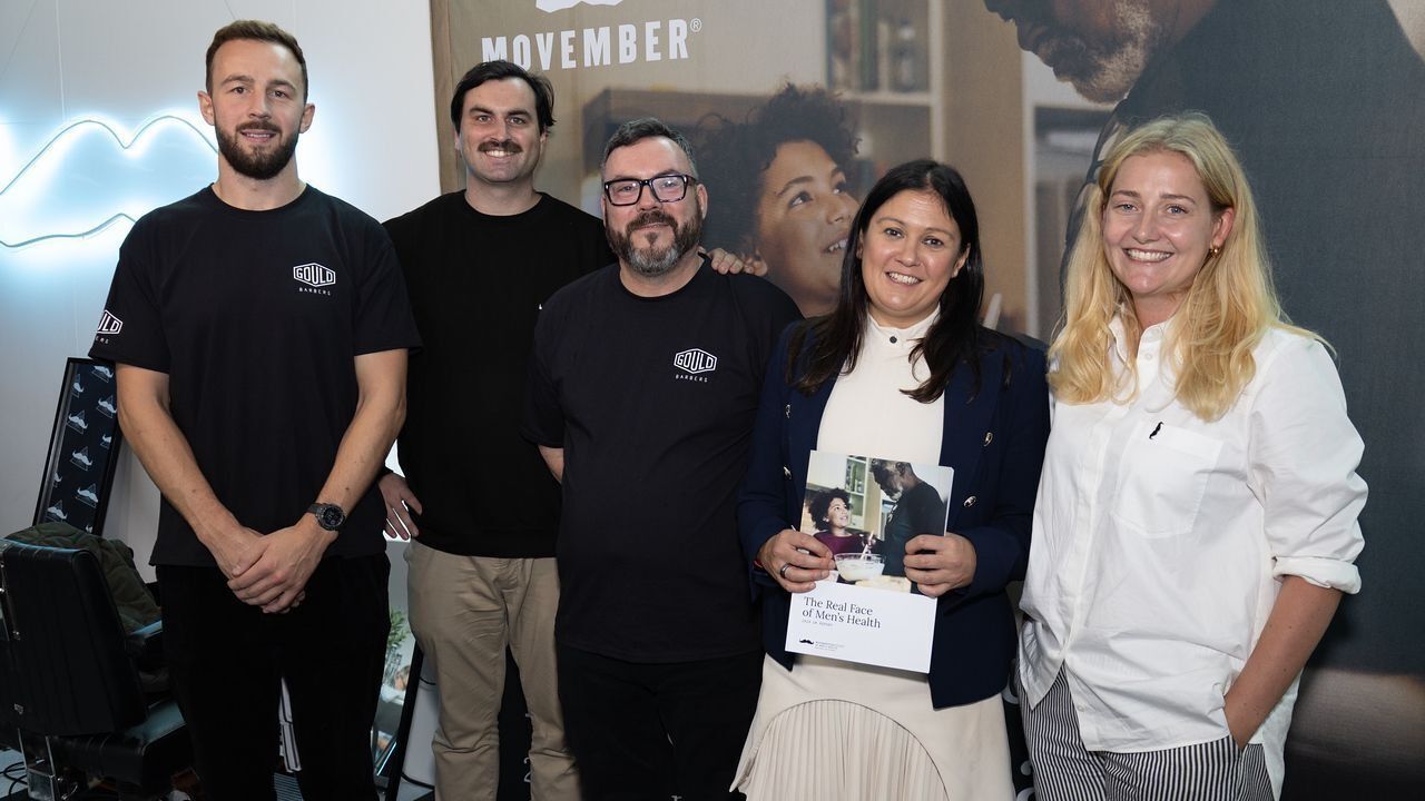 Group photo of Movember staff with Secretary of State, Lisa Nandy