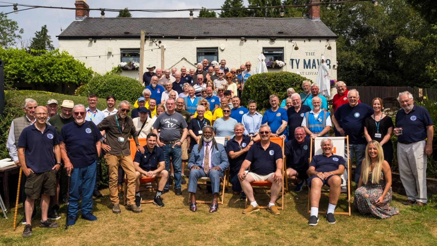 Group of guys and Movember founder at the Men's Shed