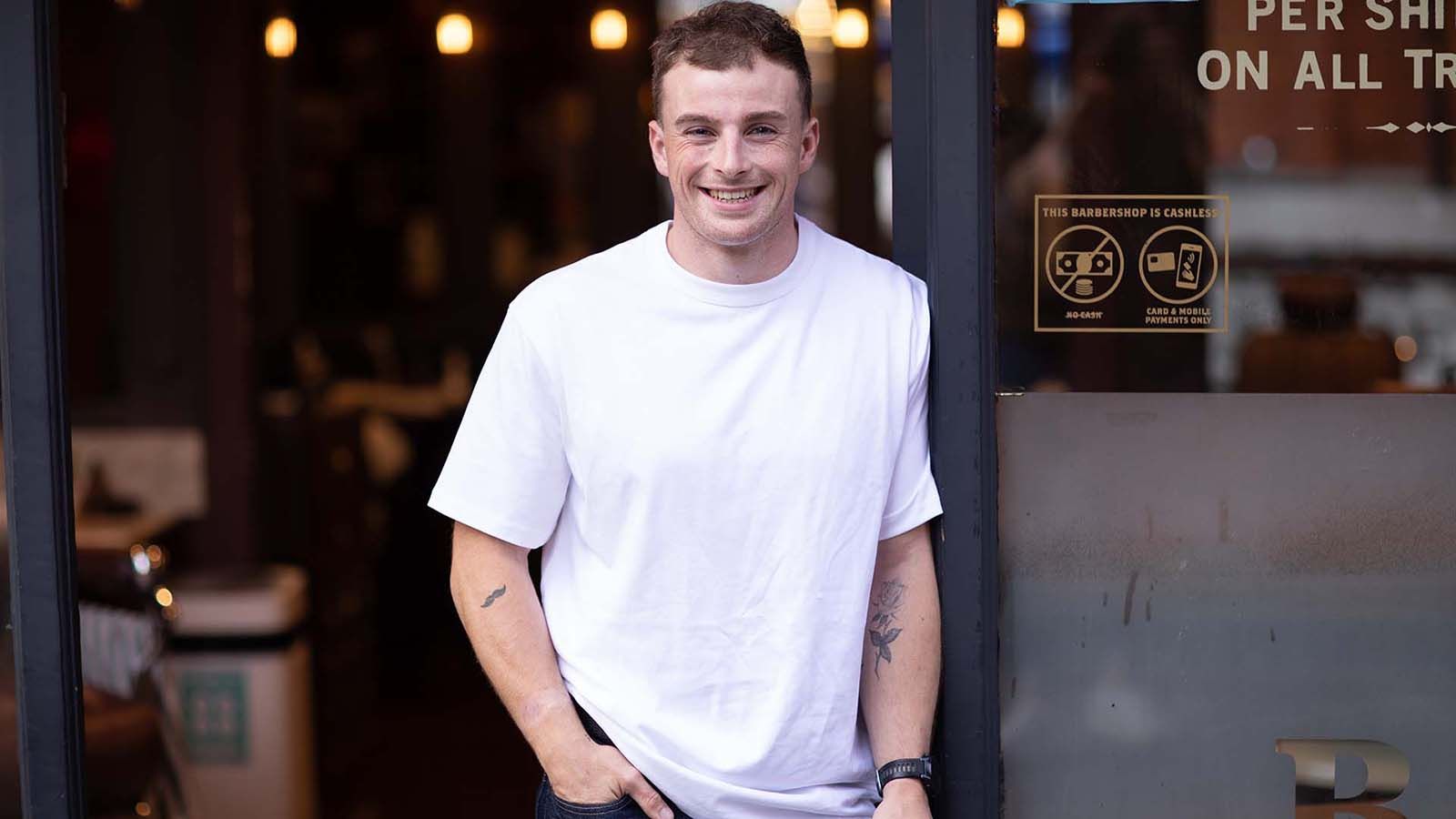 Athletic young man in t-short looking to camera