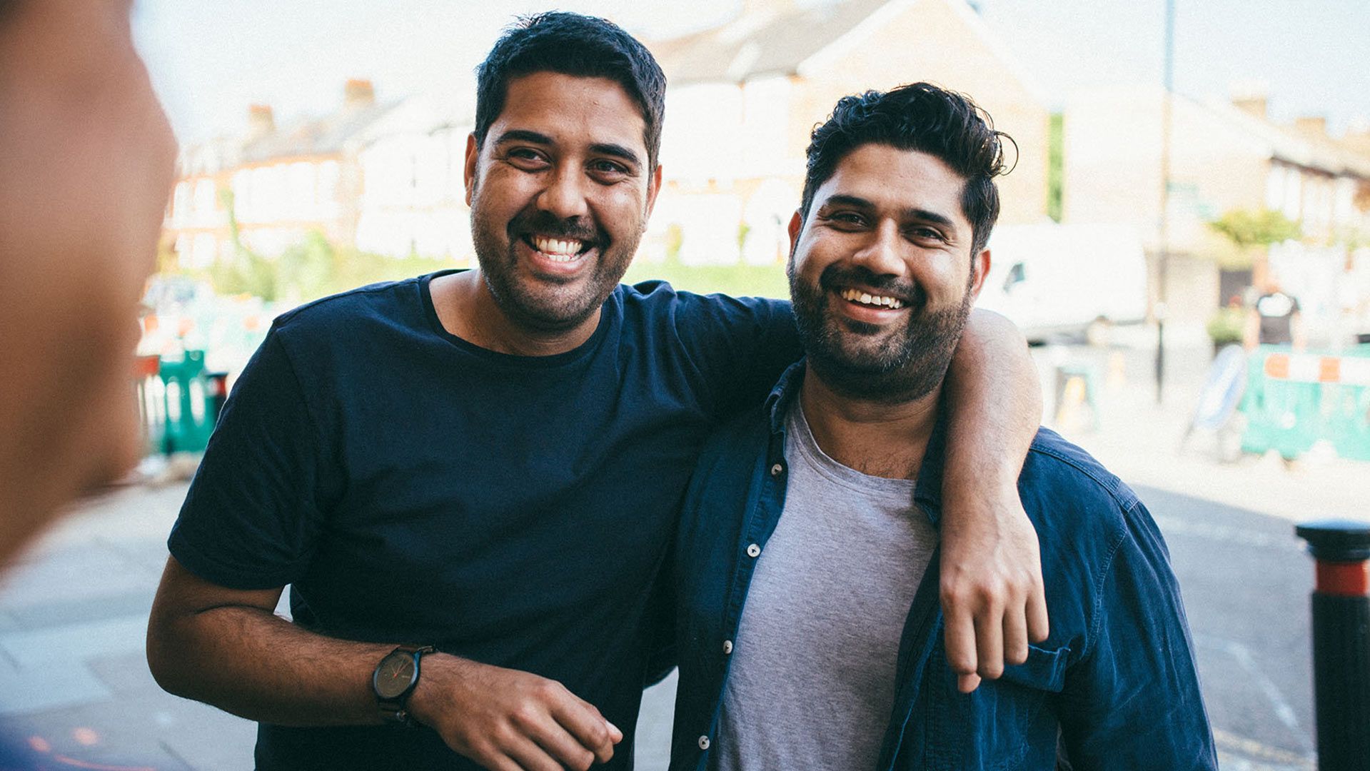 Photo of two men looking to camera.