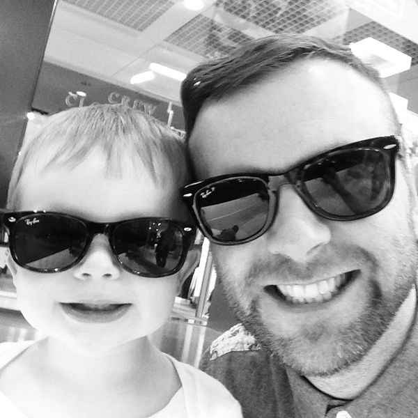 Photo of Movember Ambassador Bob flood with a small child.