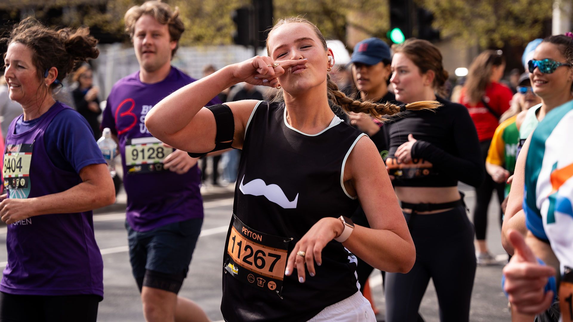 Photo of runner at Paris Marathon, wearing Movember-branded running gear.